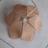 Suspension in metal and rafia