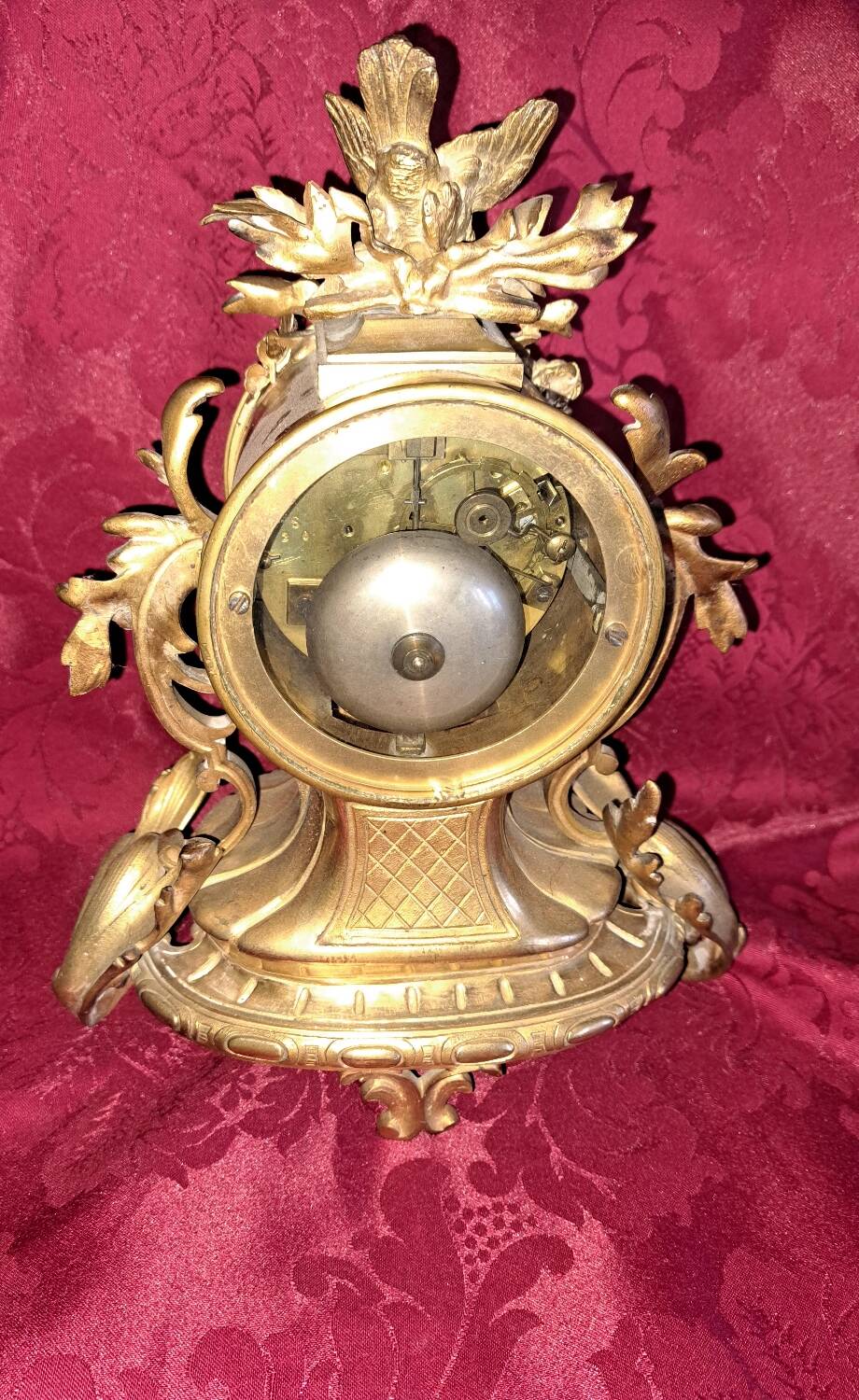 Clock, cartel in gilded bronze. Louis XV