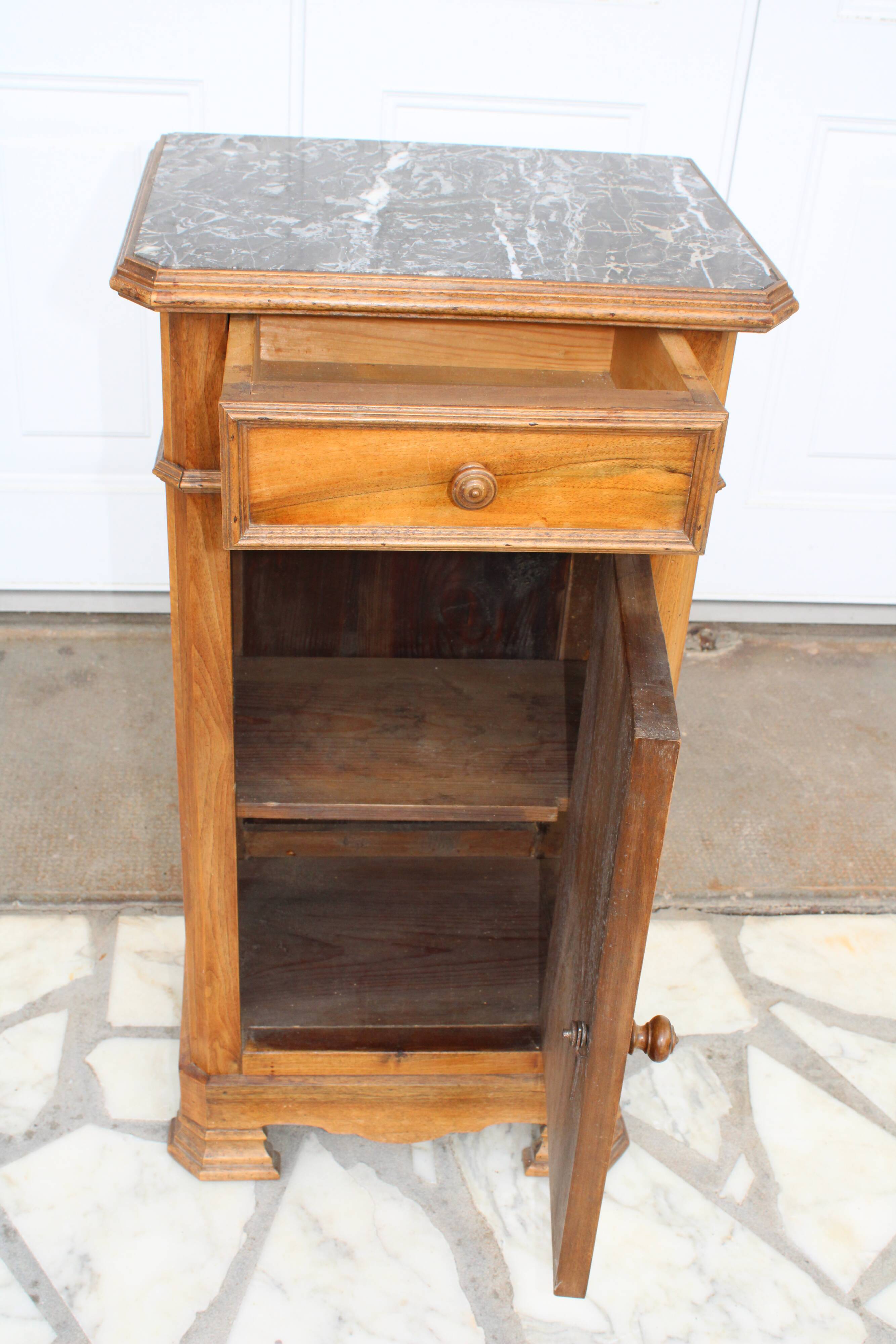 Antique bedside table with marble top