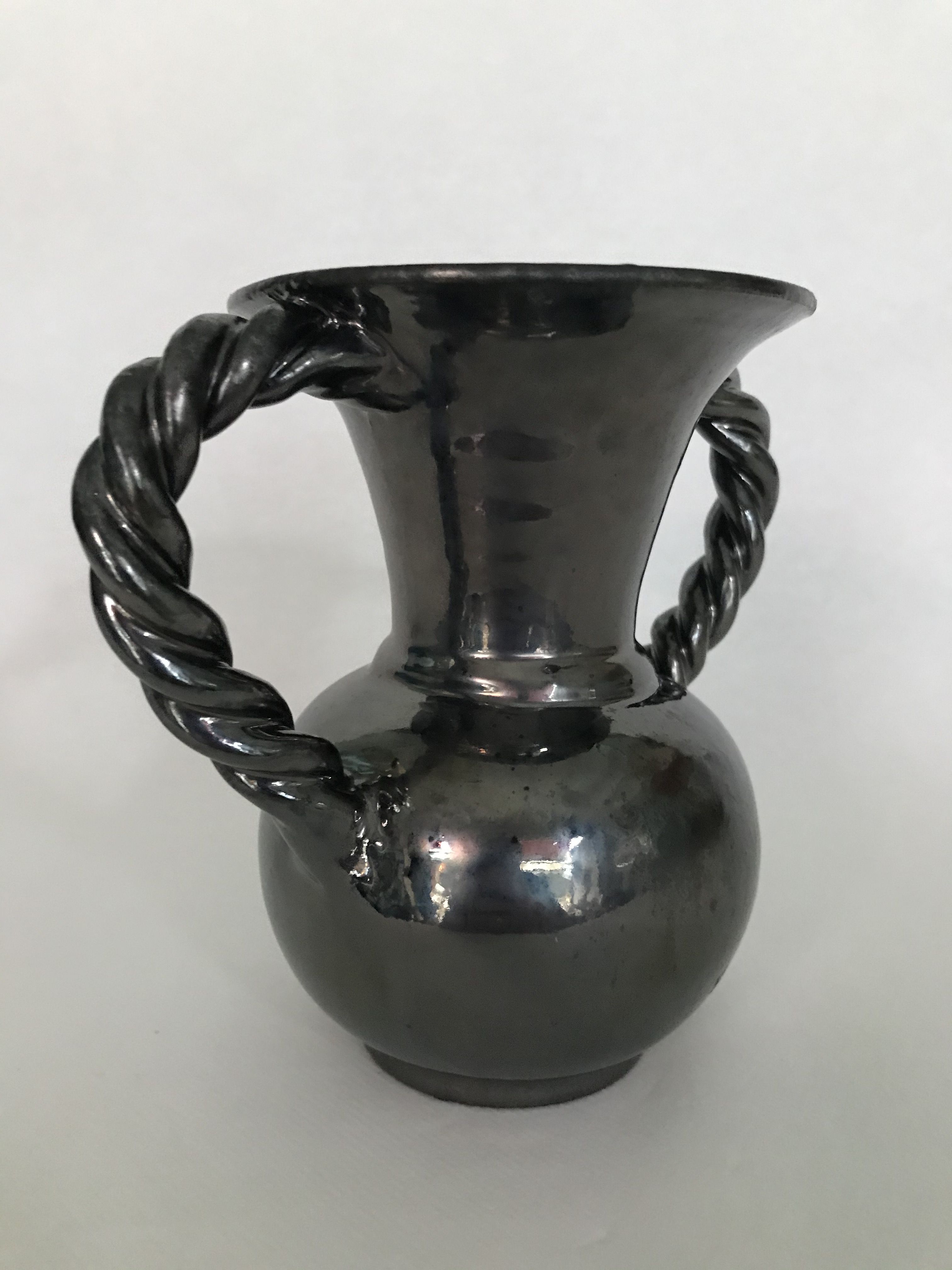 Black vase with twisted handles signed Blaise Rubino in Vallauris, circa 1950/1960