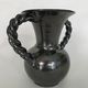 Black vase with twisted handles signed Blaise Rubino in Vallauris, circa 1950/1960