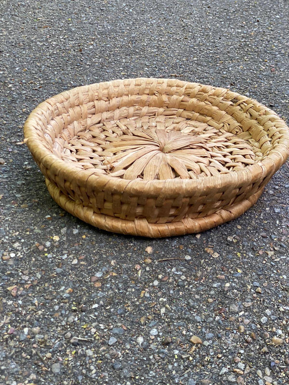 Round basket woven from banana fibre.