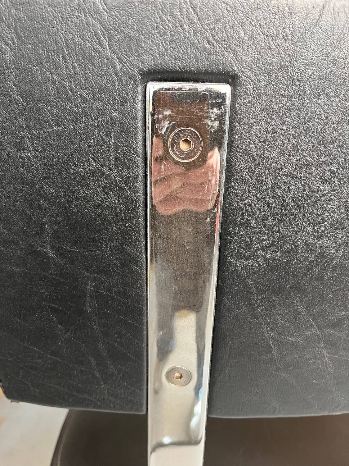 Metal chairs with black faux leather from the 1980s.