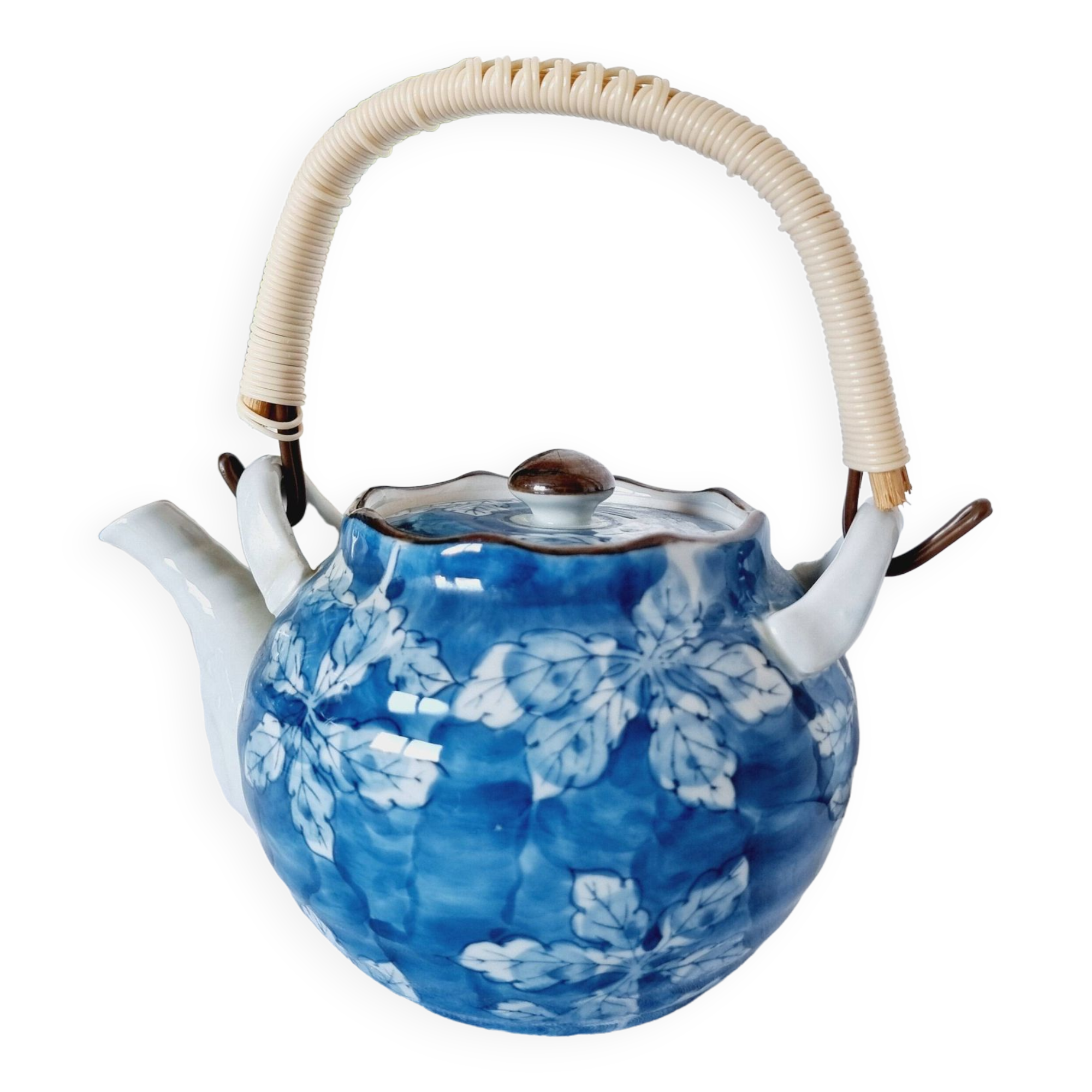 Handcrafted Japanese porcelain teapot hand painted in blue and white.