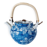 Handcrafted Japanese porcelain teapot hand painted in blue and white.