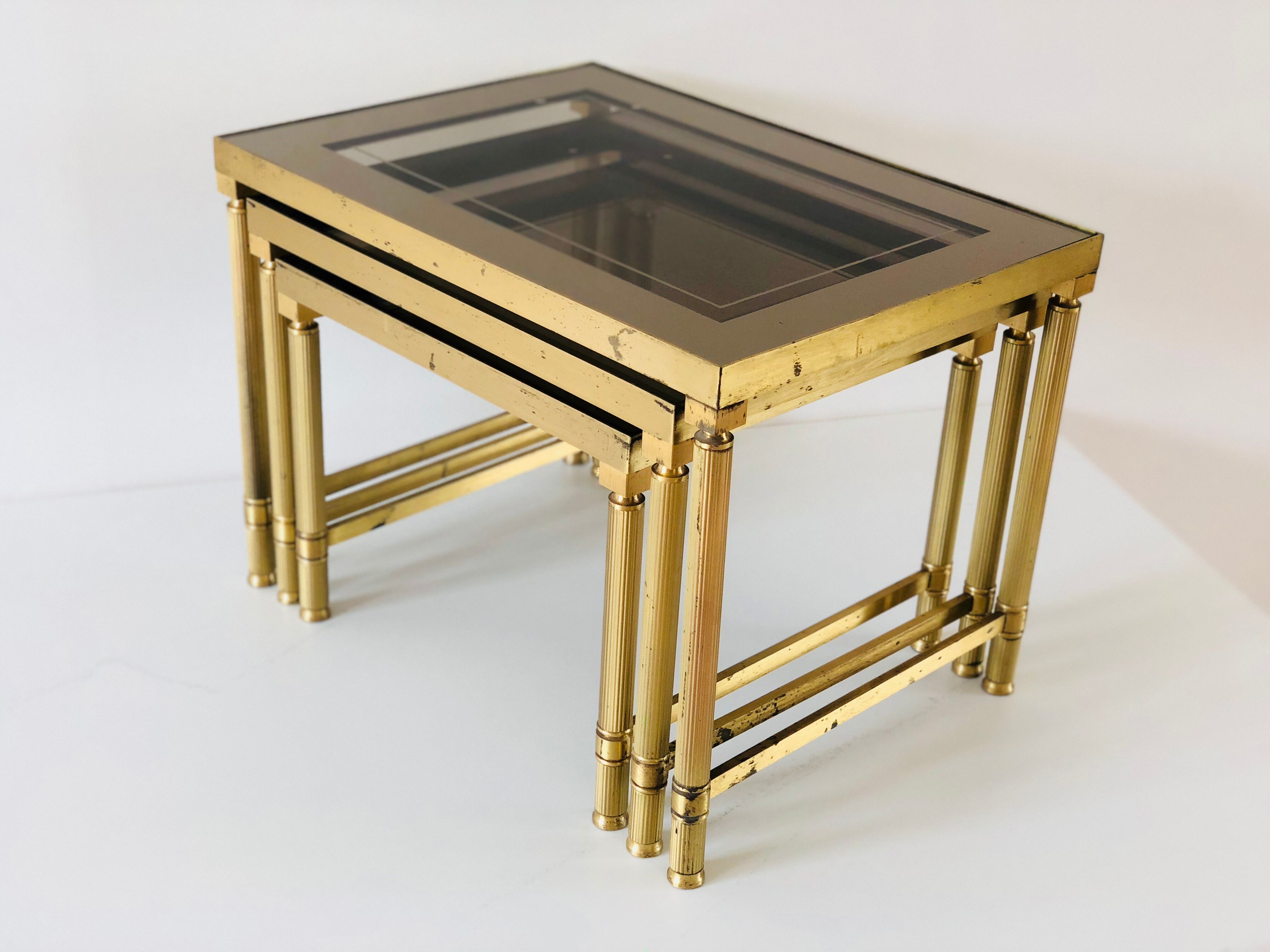 Brass and smoked glass trundle table