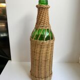 bottle surrounded by rattan 70s