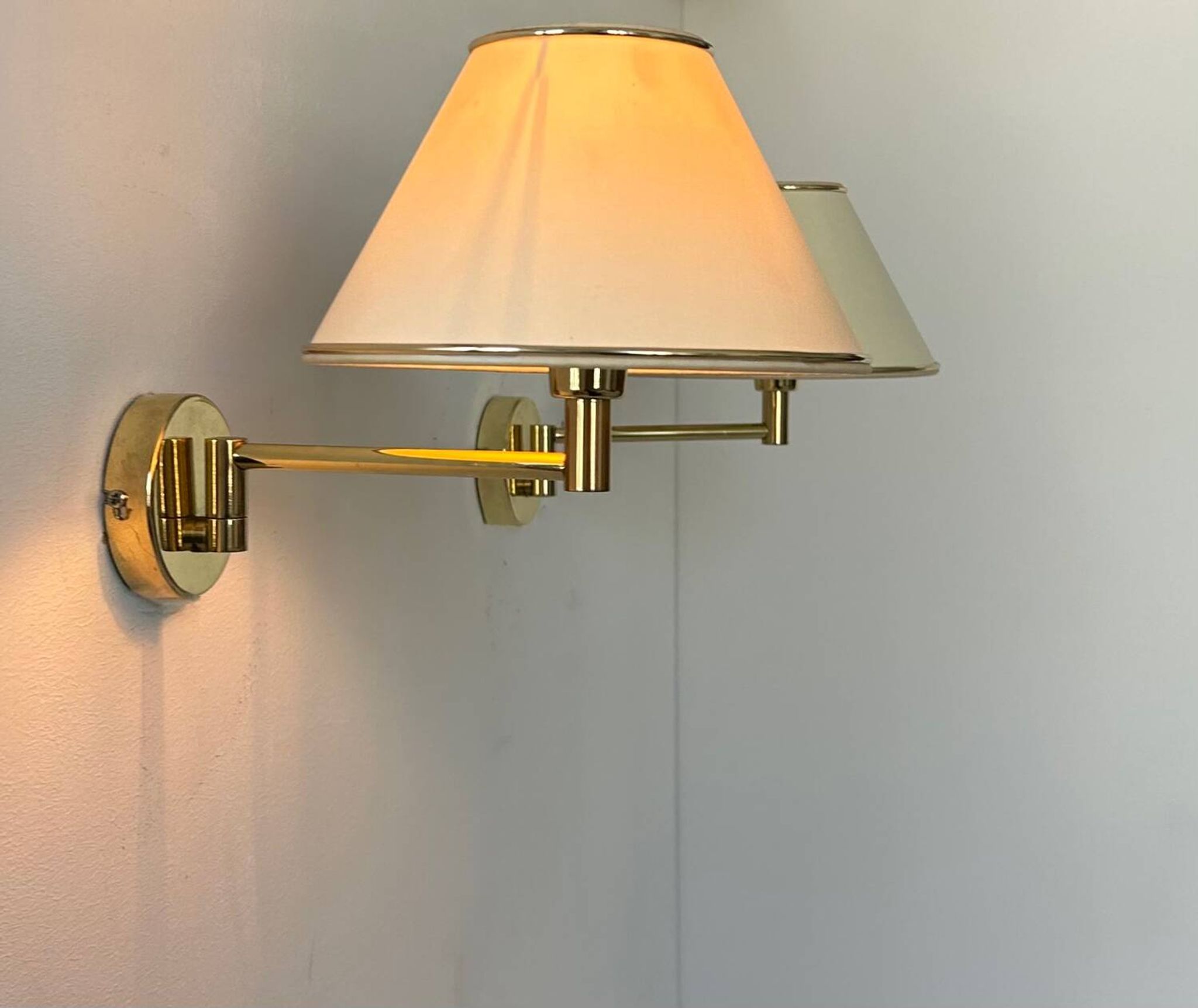 Vintage adjustable wall lamp, brass and beige fabric, France 1970