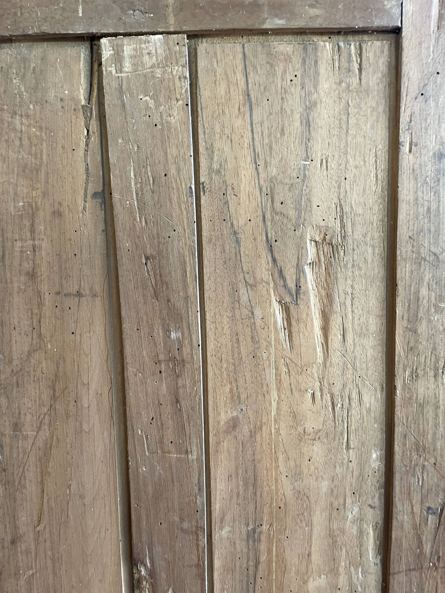 France old 18th century walnut closet door. Composed of 8 finely carved panels.