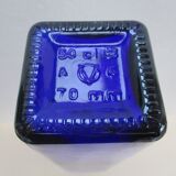 Blue glass bottle, square
