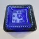 Blue glass bottle, square