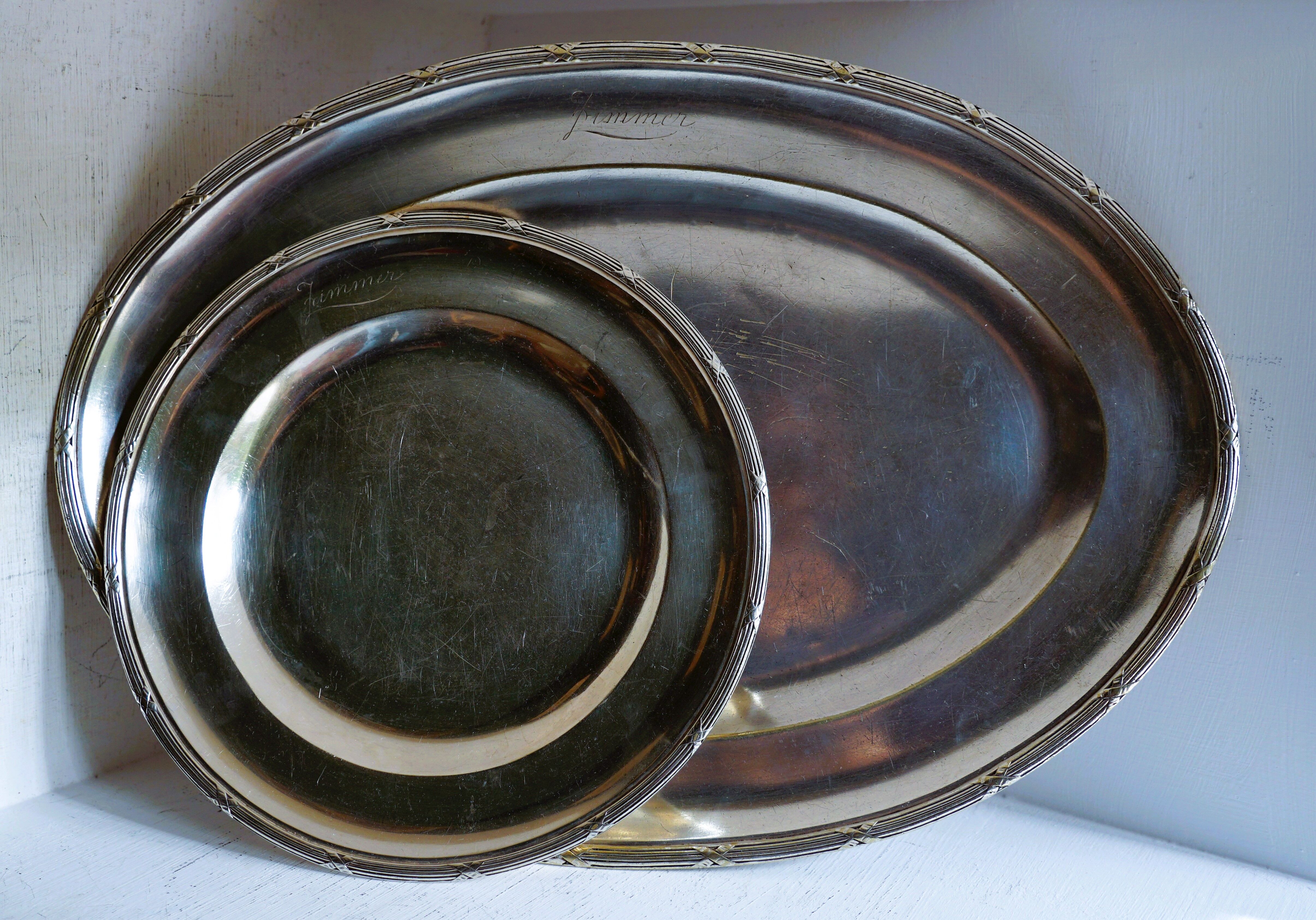 2 silverware serving dishes