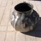 Pewter vase with vine decoration, 1930