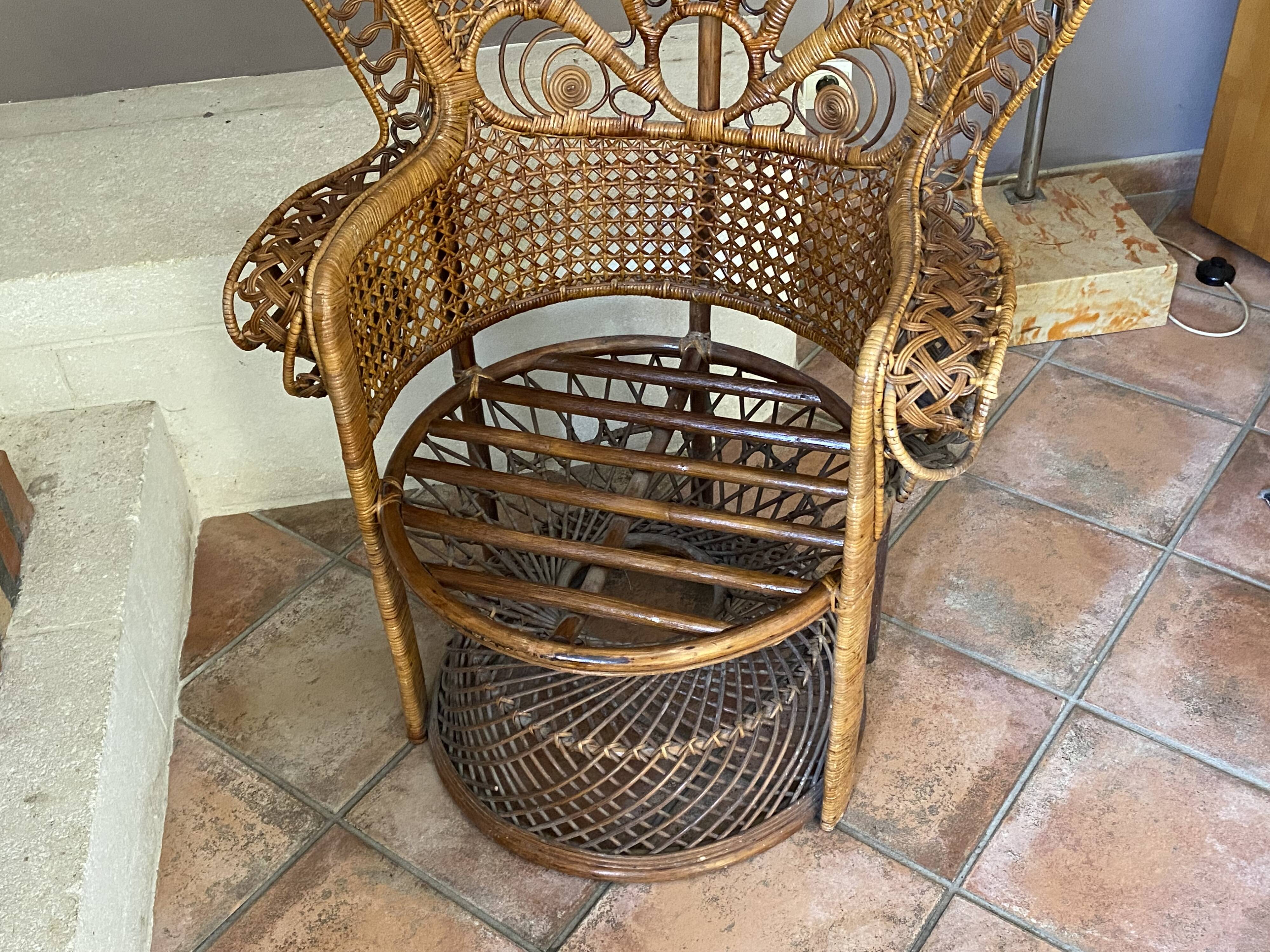 Large Emmanuelle rattan armchair. 1970.