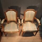 Paire de fauteuil tapissés style Louis XVI