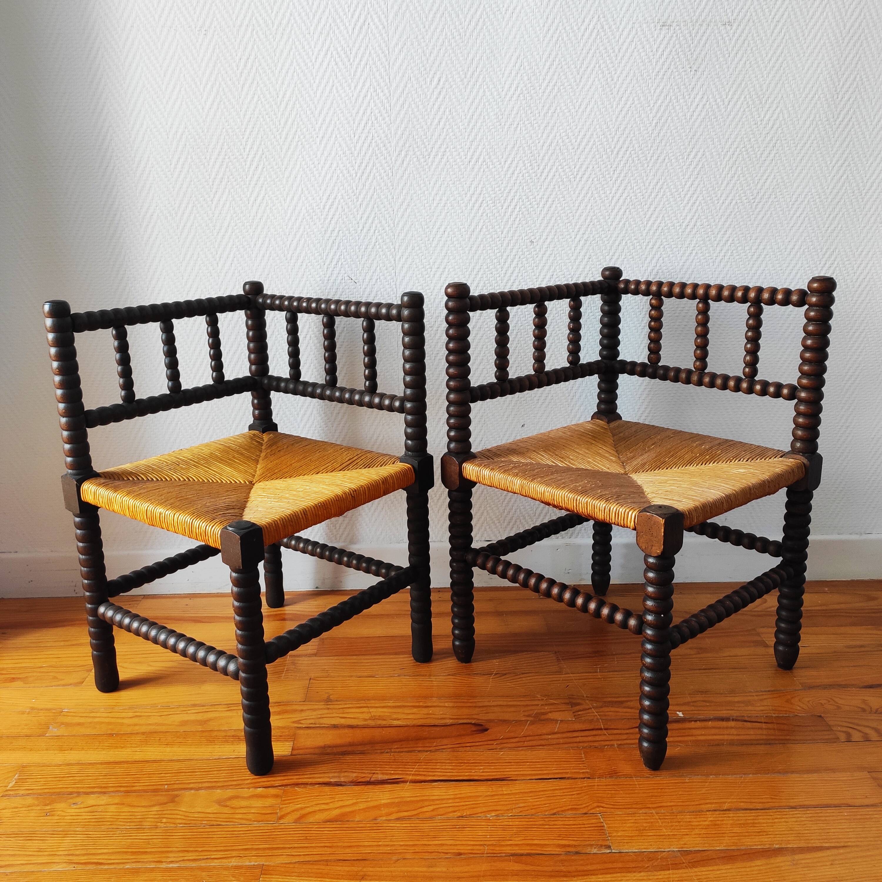 Pair of French corner chairs - turned wood, mid-20th century.