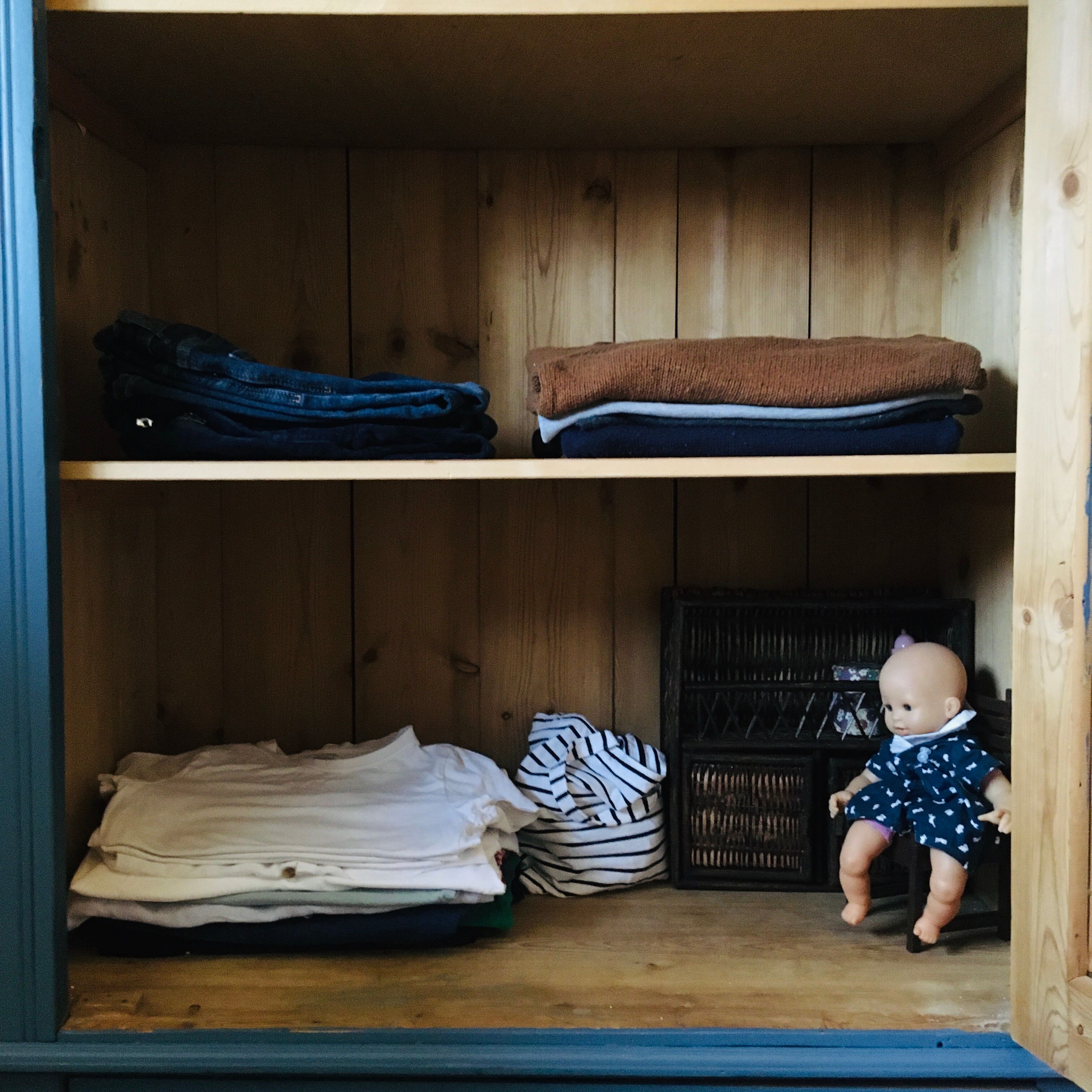 Doll cabinet in rattan and wood
