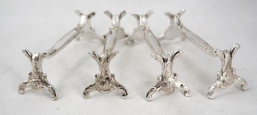 Christofle Chrysanthème, 4 silver-plated knife rests, excellent condition.
