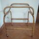 Rattan cradle with its support