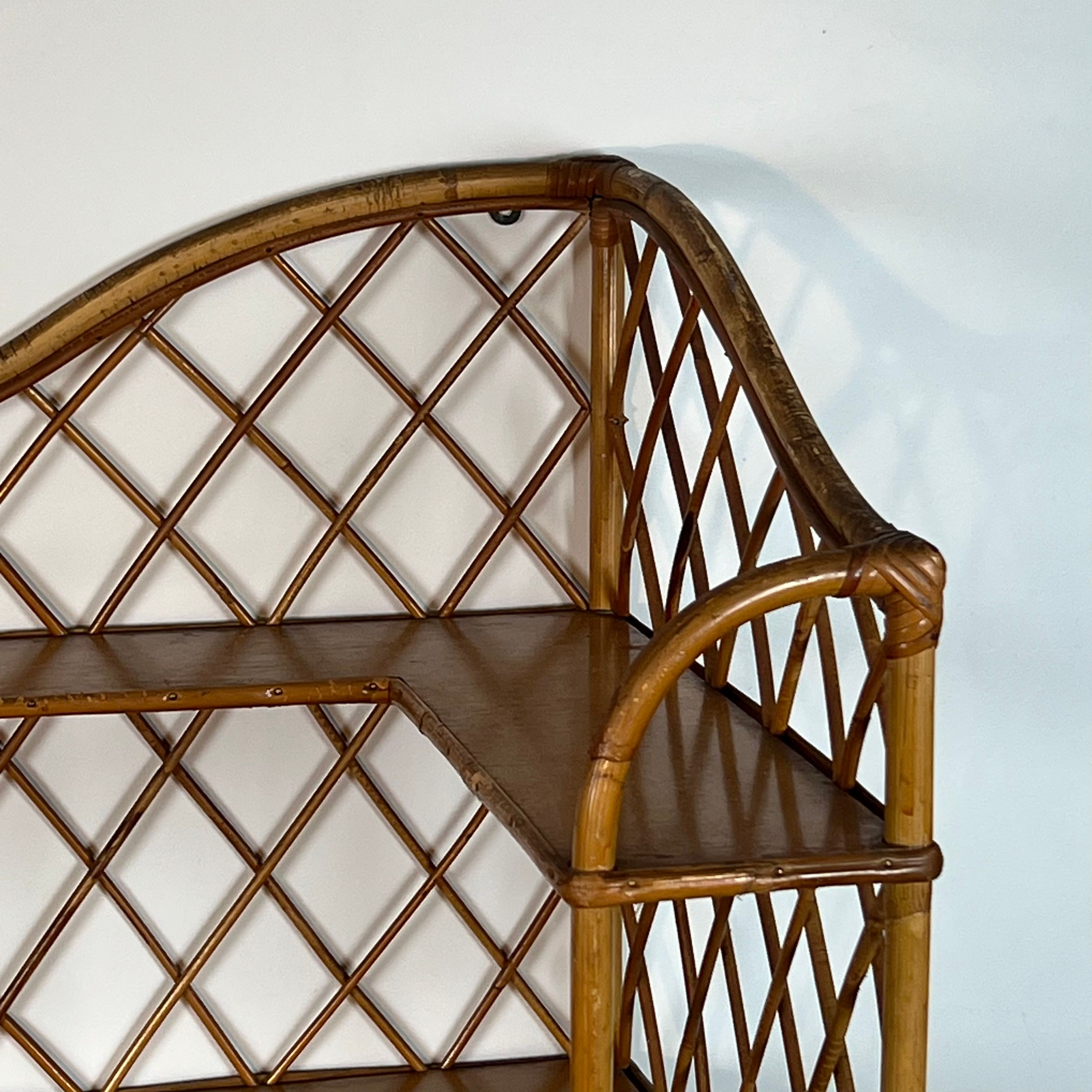 Corner wall shelf in rattan attributed to Audoux-Minet.