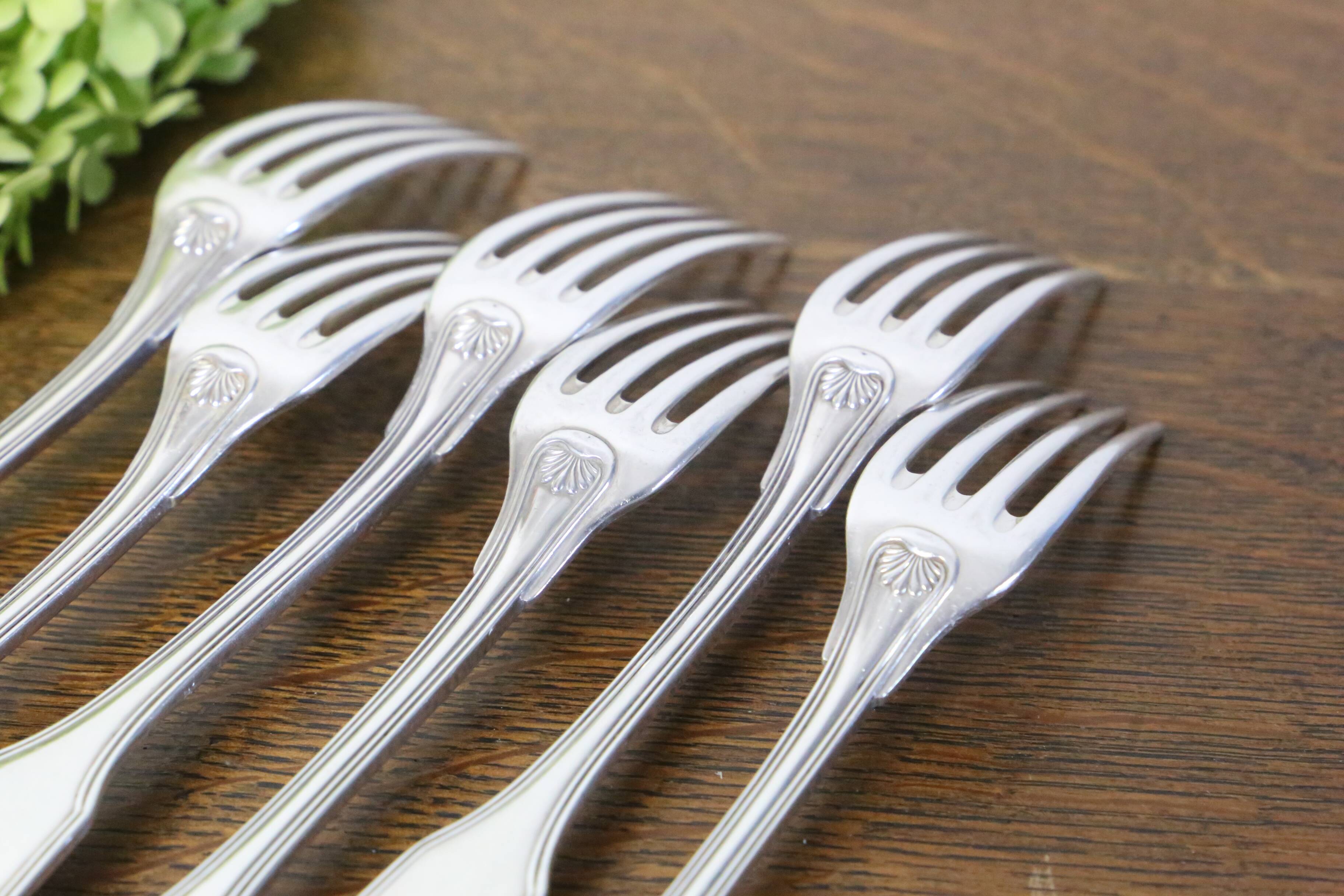 Set of 6 Cailar Bayard dessert forks, Coquille, monogrammed, early 20th century