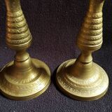 Former pair of bronze candlesticks