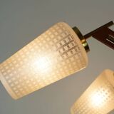 Lustre en teck, laiton et verre à 8 lumières de style sputnik des années 1960.