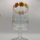 Vintage stemmed glass with floral decoration