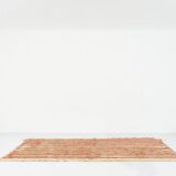A handmade Moroccan striped terracotta rug, 150/250cm