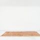 A handmade Moroccan striped terracotta rug, 150/250cm