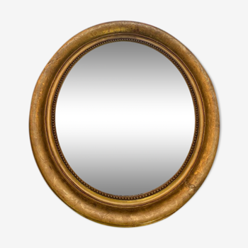 Golden oval round mirror