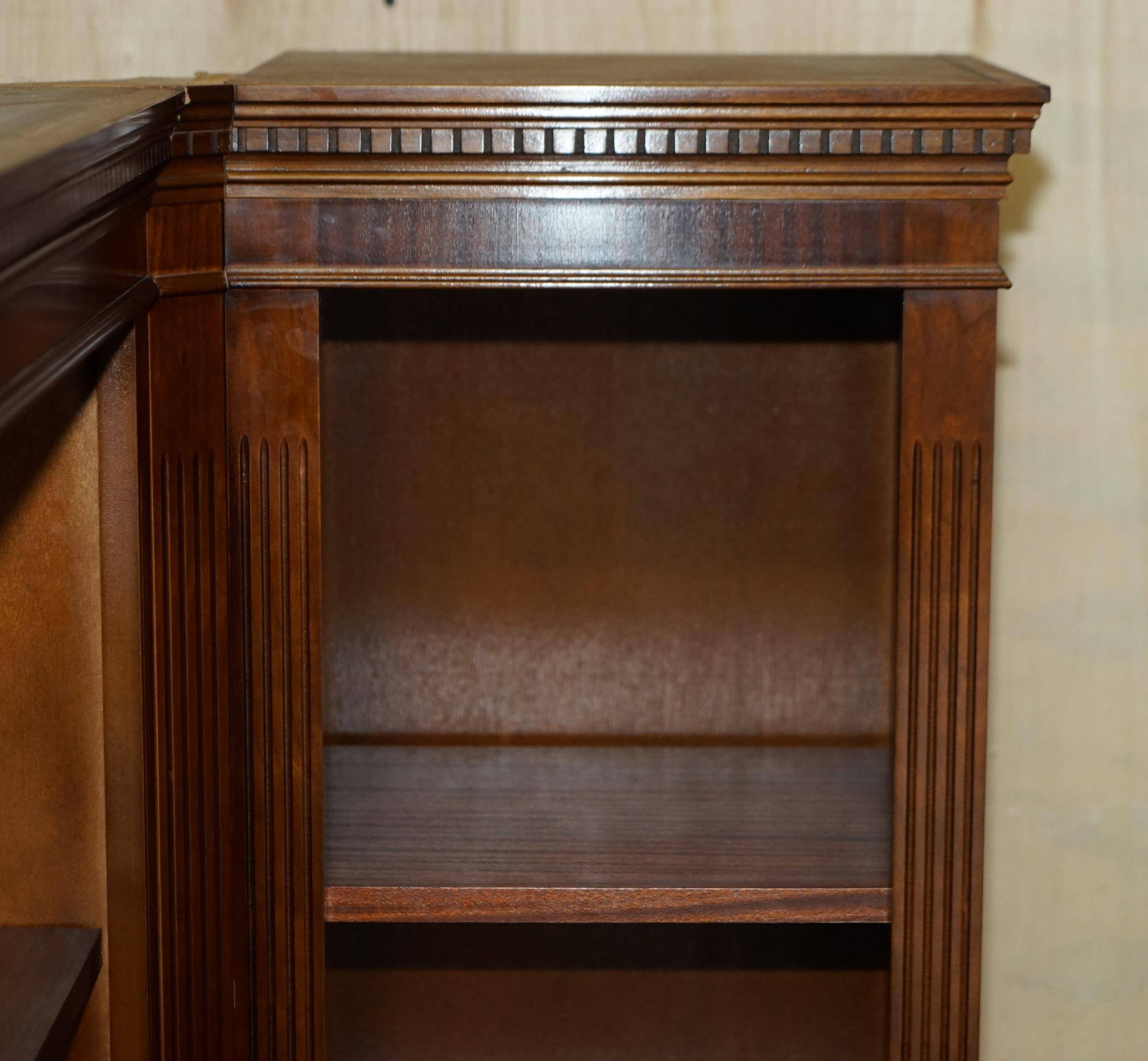 Corner library made of flamed hardwood, in 3 parts.