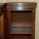 Corner library made of flamed hardwood, in 3 parts.