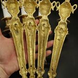 Suite de 4 appliques à 1 feu style Louis XVI du XIXe - bronze doré