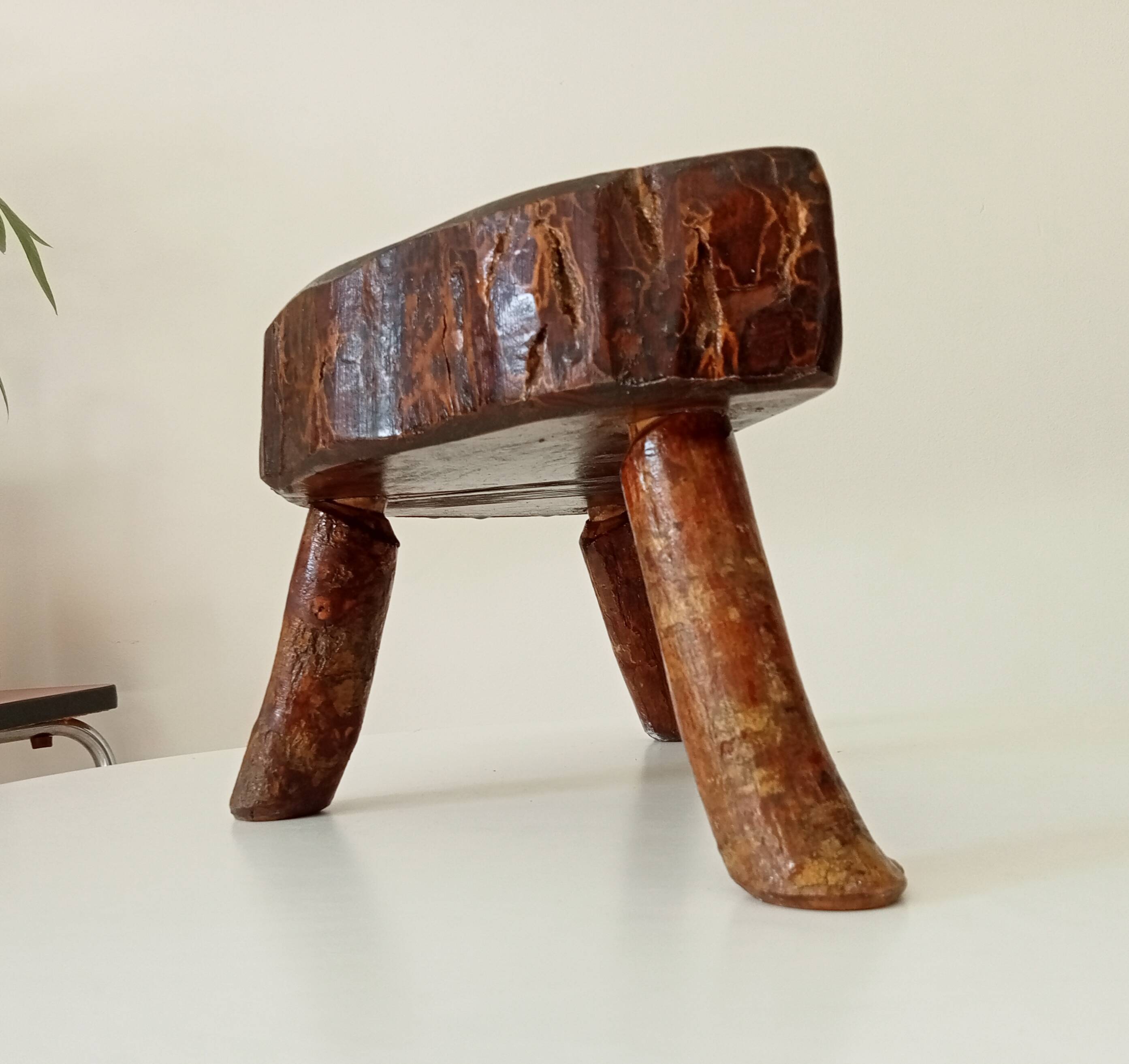 Vintage brutalist tripod stool in solid olive wood