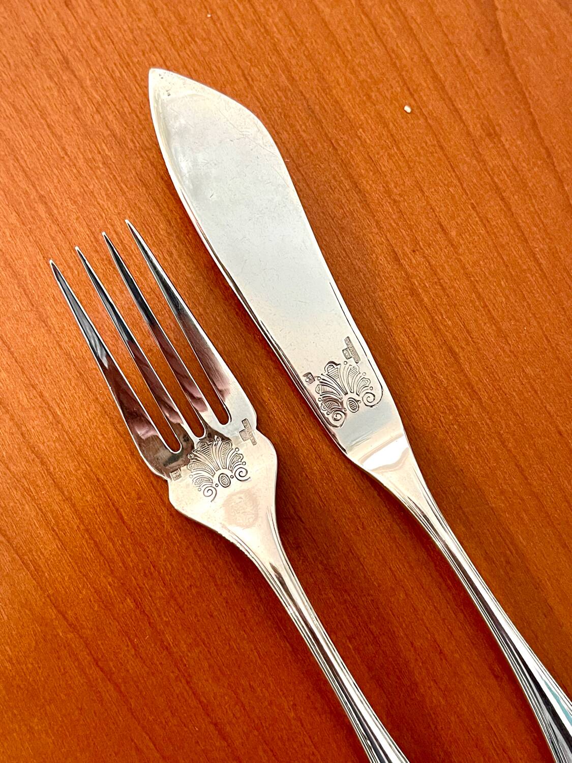 Christofle Marot Berain, 12 fish cutlery sets, shell decor