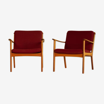 Pair of armchairs PJ 112 by Ole Wanscher in mahogany and burgundy wool
