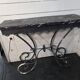 Massive wrought iron console from the 20th century.