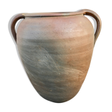 Old jug with two sandstone handles