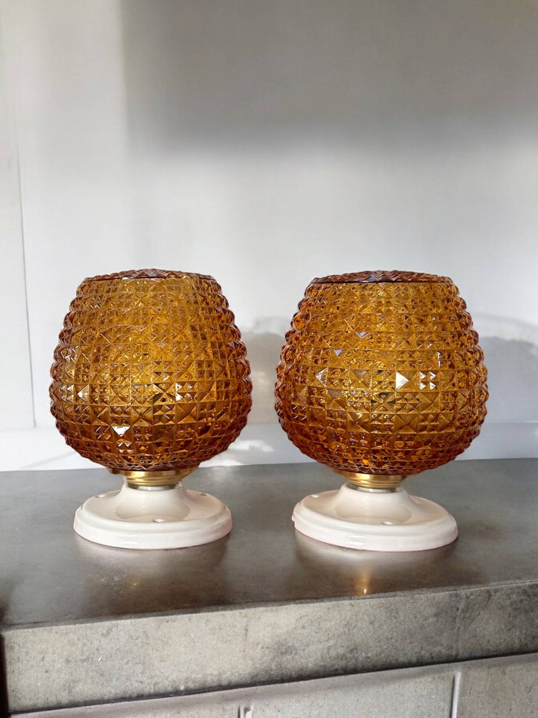 Pair of gold glass wall sconces