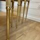 Set of 3 vintage nesting tables in onyx and gold metal from the 1970s.