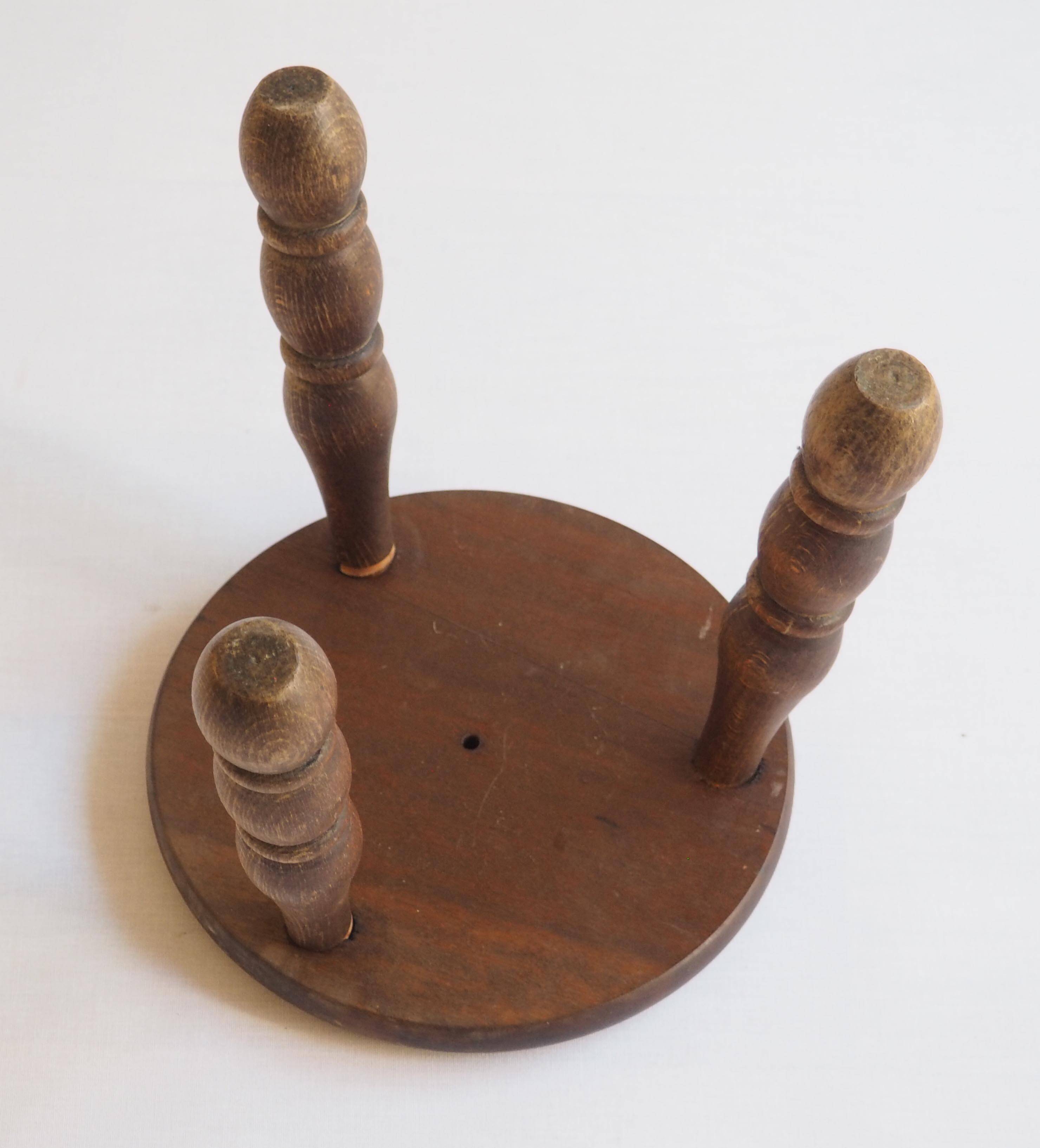 Tripod stool for wooden plant holder