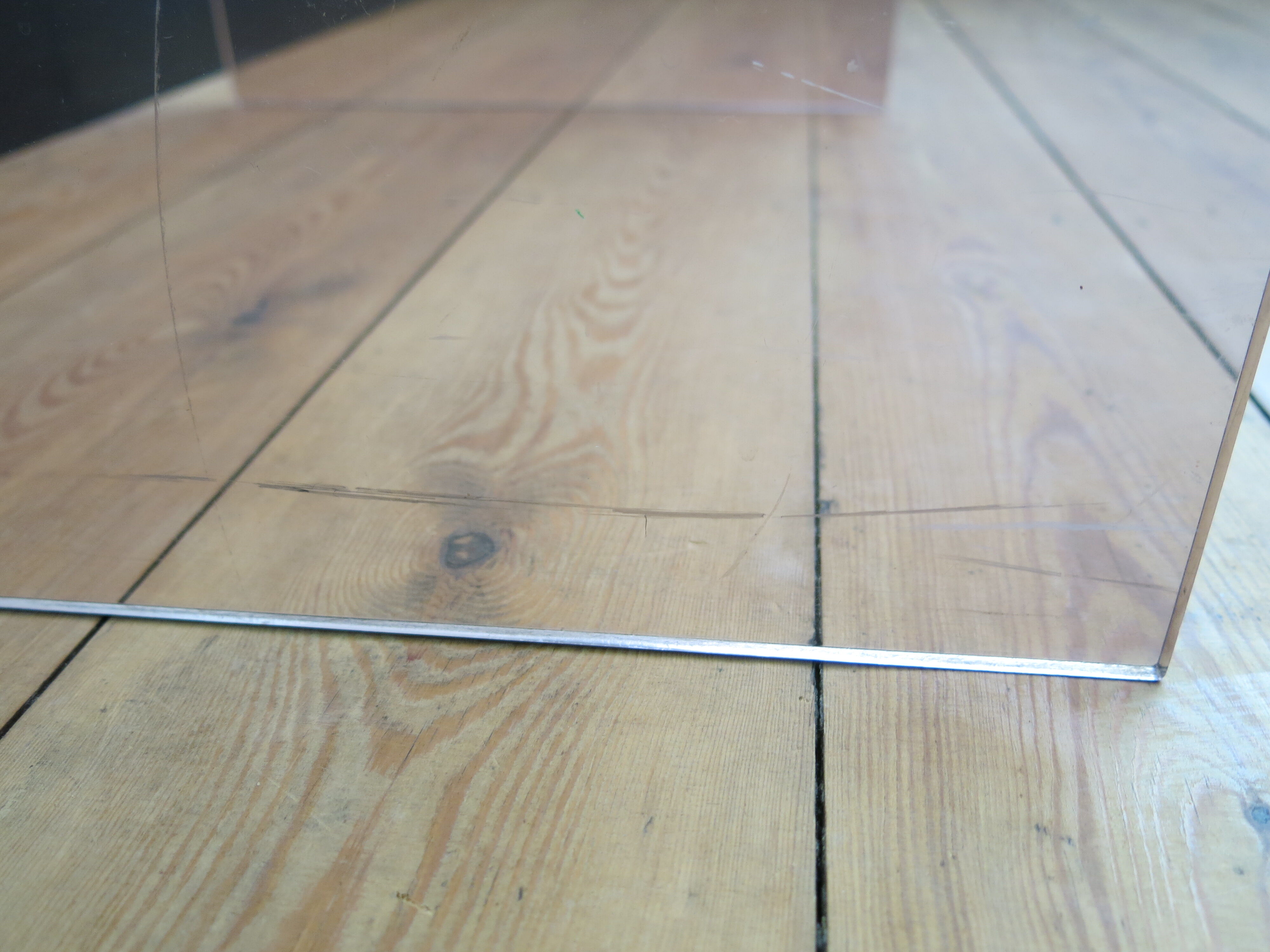 Plexi nesting tables by Michel Dumas