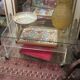 vintage glass coffee table with plexiglass legs