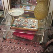 vintage glass coffee table with plexiglass legs