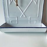 Old enamelled kitchen utensil display