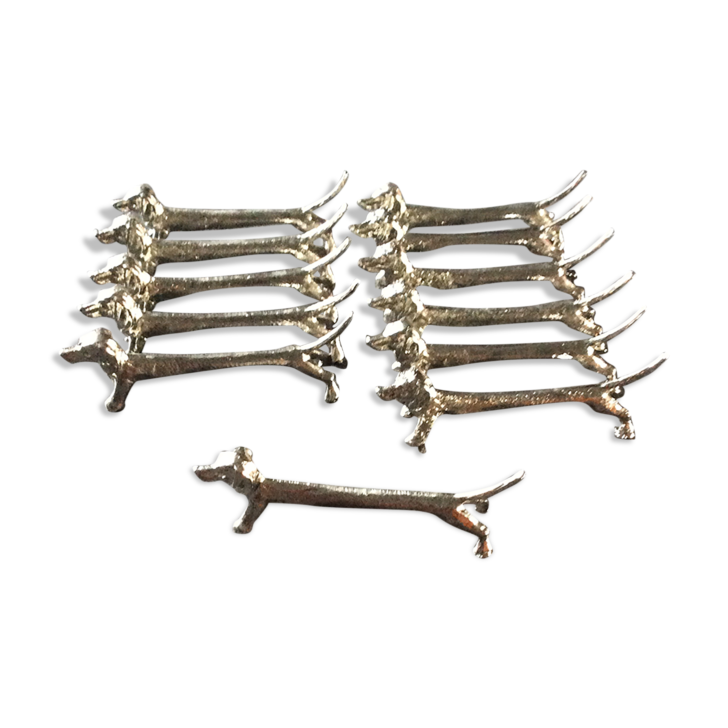 Series of 12 vintage knife holders dogs in silver metal