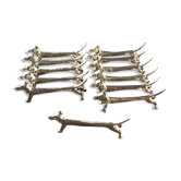 Series of 12 vintage knife holders dogs in silver metal