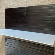 Pair of contemporary shelves in steel and stained wood