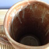 Pitcher in water in sandstone